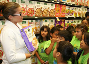 Whole Foods Marketing Director Natalie White  discusses the benefits of natural food cereals  with children.